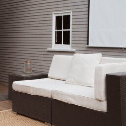 vacant white and brown sectional sofa in room